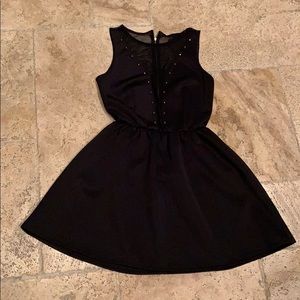 Black skater dress with mesh and gold detailing